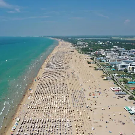 Colorful With Fenced Garden And Fireplace Apartment Bibione